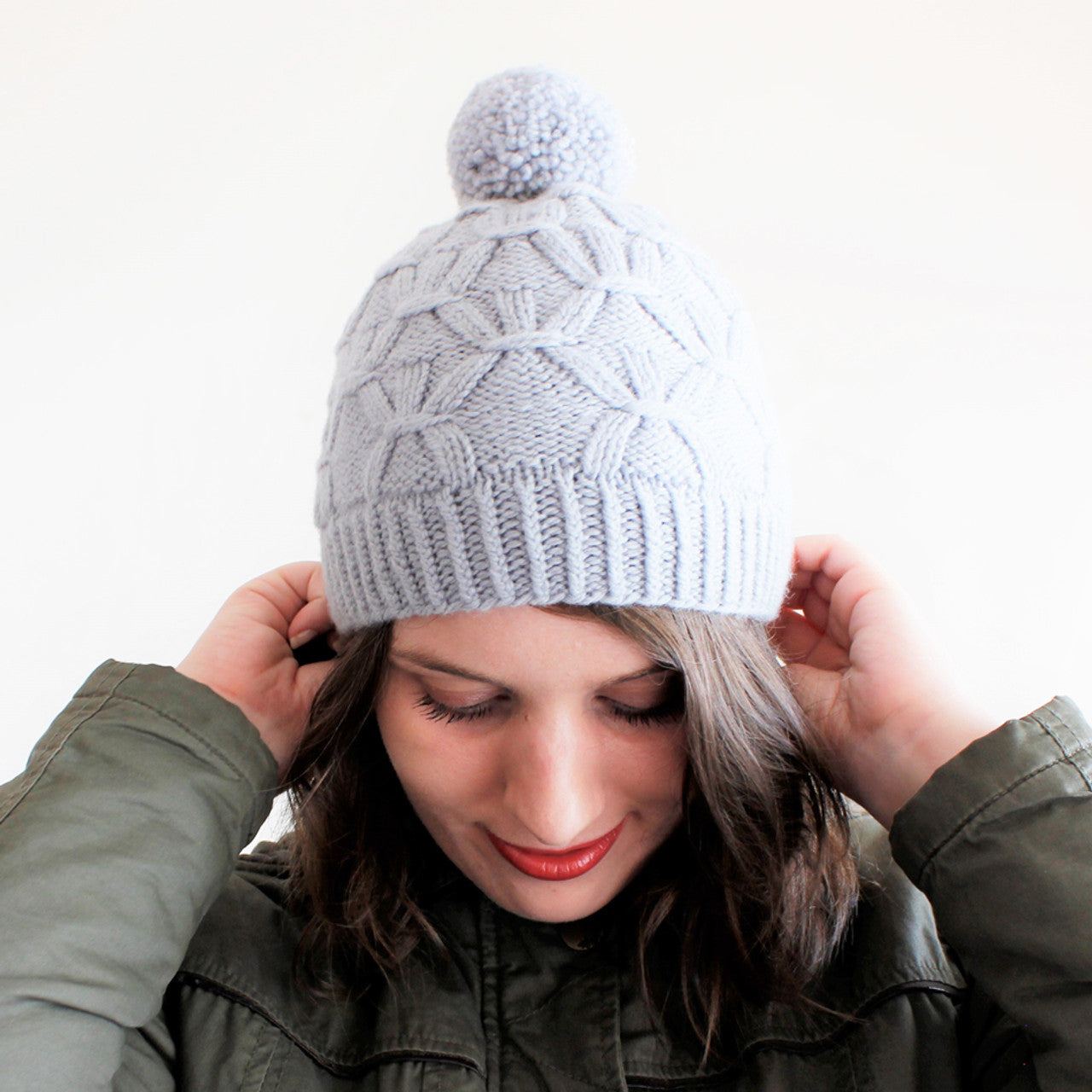 Winter Dusk Hat. - by the sweater collective. 155yds DK weight for hat, add 28 yds for pompon. One skein of our Tunis DK, Cormo Dk, or Farm Friends DK will make it!
