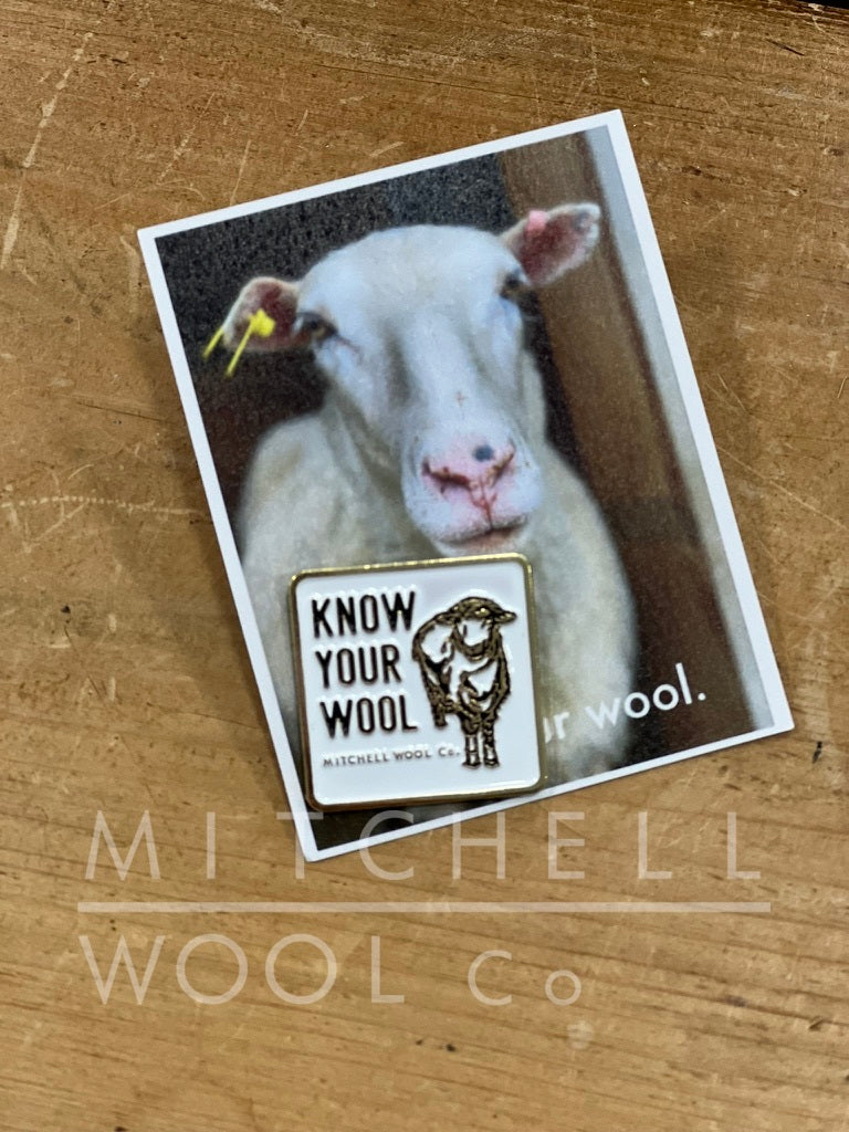 Know Your Wool pin in white on gold