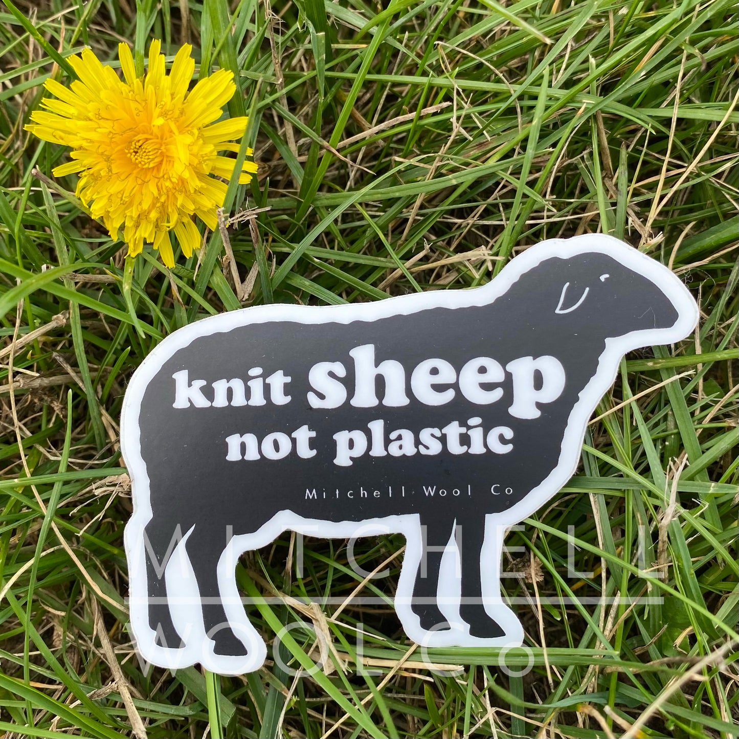 3.5x2.5, black and white sheep silhouette sticker, that says "knit sheep not plastic"  