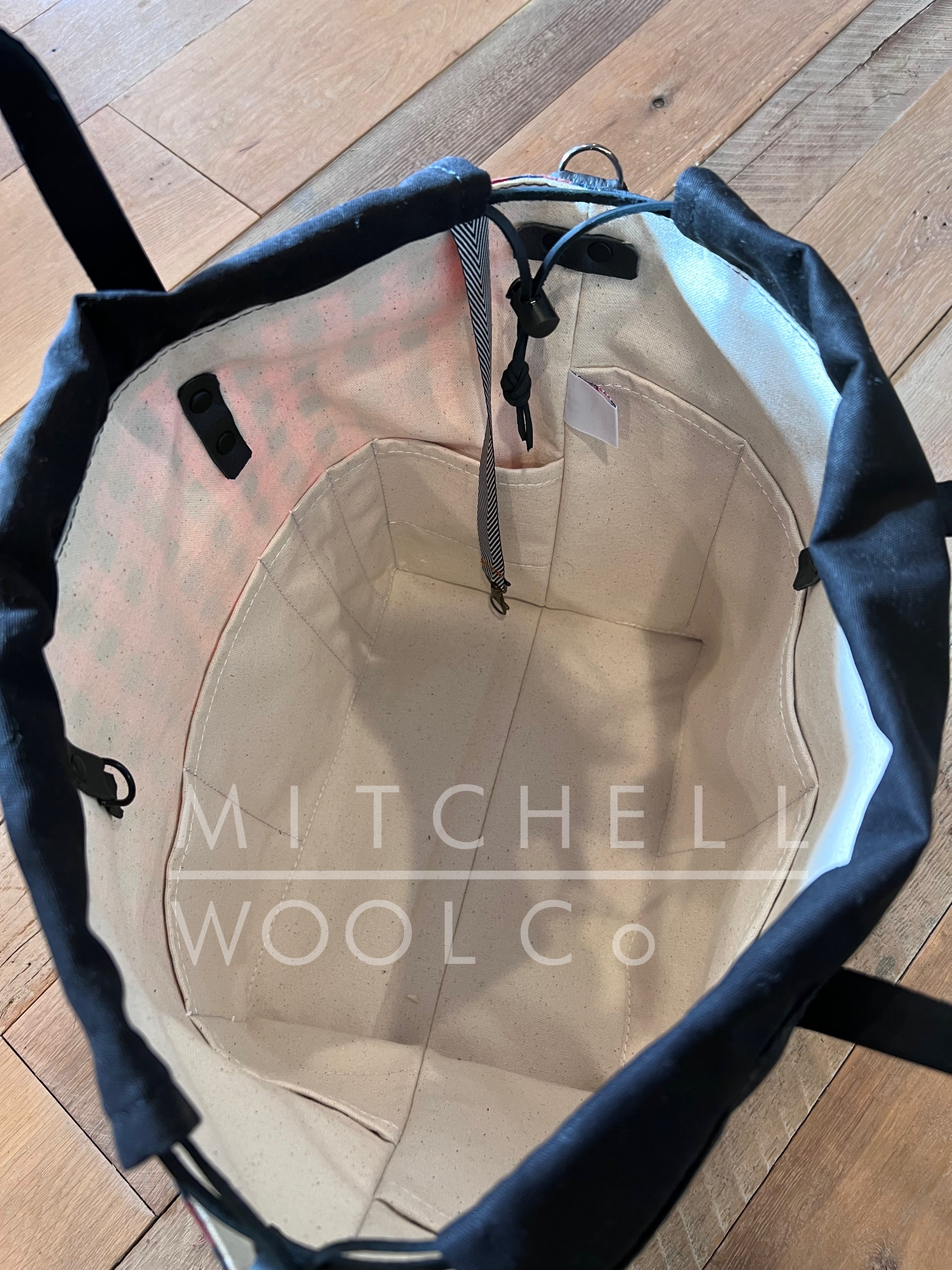 The buffalo Plaid Sherry's Sweater Bag shown open