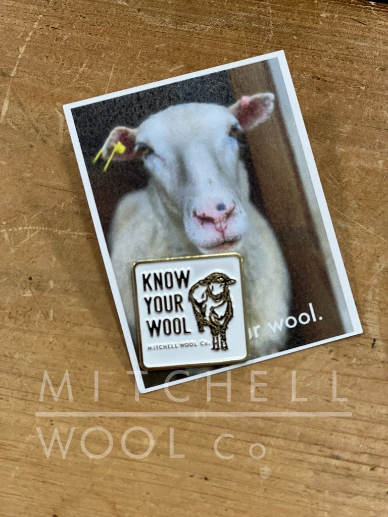 Know Your Wool pin in white on gold