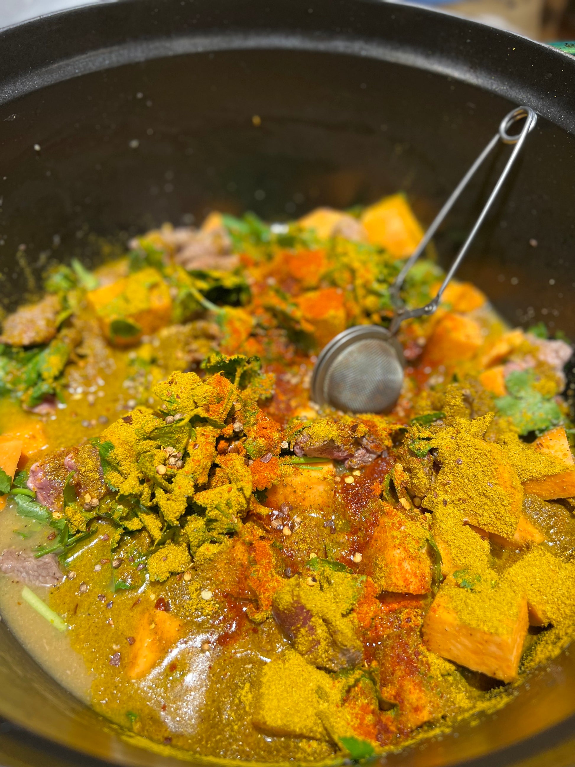 a curry from our pasture raised lamb, sweet potatoes, peas & beef bone broth